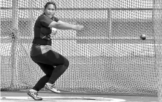  ??  ?? Michelle Wong Kung Lu from Sarikei in action to win the Girls’ 15 hammer throw by recording 37.52m. — Photo by Teo Chi Wei