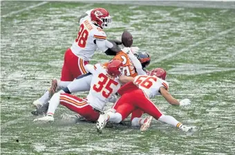  ?? Helen H. Richardson, The Denver Post ?? Denver’s Melvin Gordon fumbles in the first quarter against the Kansas City Chiefs at Empower Field at Mile High on Sunday. Gordon had two turnovers on the day.