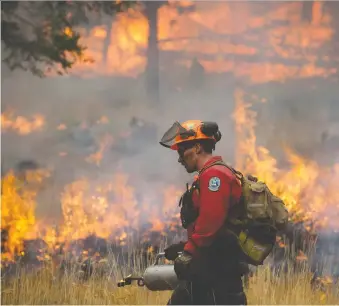  ?? DARRYL DYCK/THE CANADIAN PRESS FILES ?? The B.C. Wildfire App includes maps of wildfires in Alberta, B.C. and the western United States. More than 27,000 users and counting have installed the app so far this year.