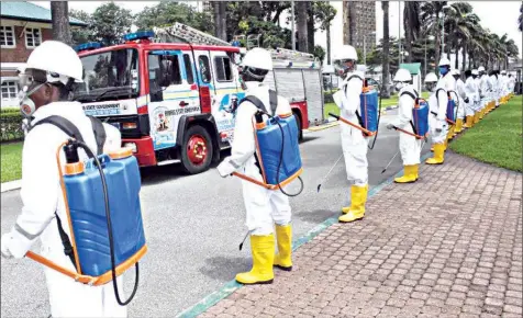  ??  ?? A cross section of members of Rivers State COVID- 19 decontamin­ation team during their inaugurati­on by Governor Nyesom Wike in Port Harcourt… yesterday. PHOTO: NAN