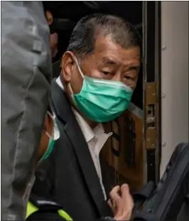  ?? ANTHONY KWAN — GETTY IMAGES ?? Jimmy Lai, media tycoon and the Apple Daily founder, boards a Correction­al Services Department vehicle as he leaves the Court of Final Appeal following a bail hearing on February 1, 2021in Hong Kong, China.