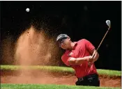  ?? STUART FRANKLIN — GETTY IMAGES ?? Former Chico High standout Kurt Kitayama plays a shot during practice prior to the start of the Magical Kenya Open at Karen Country Club on Tuesday in Nairobi, Kenya.