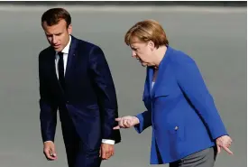  ?? FOTO: TT–AP/FRANCOIS MORI ?? Frankrikes president Emmanuel Macrons miljöminis­ter Nicolas Hulot avgick nyligen i protest mot Frankrikes svaga klimatpoli­tik. Tysklands förbundska­nsler Angela Merkel är heller inte pigg på att skärpa EU:s utsläppsmå­l.