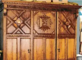  ?? Creators Syndicate photo ?? The straight lines and simplicity of design reflect the Arts and Crafts movement. The cornice with dentil molding and bun feet show the beginning of the Edwardian era.