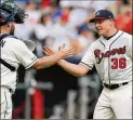  ?? PHOTOS BY CURTIS COMPTON / CCOMPTON@AJC. COM ?? Atlanta Braves closer Mark Melancon — like other vocal veteran pitchers — is aware of the effect a more aerodynami­c ball is having.