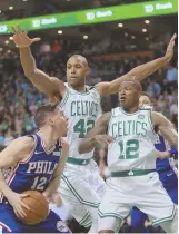  ?? STAFF FILE PHOTO BY MATT STONE ?? FIRST LOOK: Al Horford (42), Terry Rozier and the Celtics will take on the 76ers in the opening game of the 201819 NBA season at the Garden.