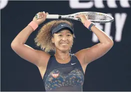  ?? ANDY BROWNBILL/AP ?? Naomi Osaka celebrates after defeating Jennifer Brady during the women’s singles final Saturday at the Australian Open in Melbourne, Australia.