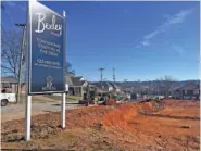  ?? STAFF PHOTO BY DAVE FLESSNER ?? A site cleared by RP Homes to build 56 townhomes at Central and McCallie avenues for a community to be known as the Bexley is shown Tuesday.