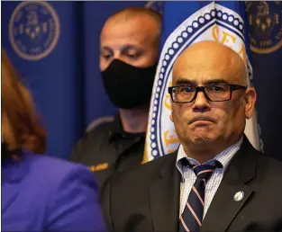  ?? RICH HUNDLEY III — TRENTONIAN FILE PHOTO ?? Trenton Mayor Reed Gusciora looks on as Police Director Sheila Coley speaks at a press conference at City Hall Wednesday, July 29, 2020.