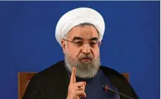  ?? Foto: Vahid Salemi, afp ?? Von vielen Seiten unter Beschuss: Präsident Hassan Ruhani.