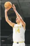  ?? MICHAEL REAVES/GETTY ?? Nate Laszewski of Notre Dame shoots a three-pointer against Radford on Thursday.