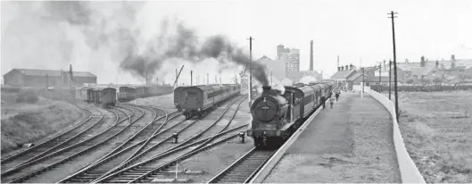  ?? Walter Dendy ?? Another 1951 scene offers something of the magnitude of Silloth’s railway infrastruc­ture. The engine shed is just out of view to the left and the curving lines on the left shortened the coal depot road when the south side of the New Dock was accessed. Meanwhile, ‘J35’ No 64478 prepares to leave the station with what appears to be a lengthy train, the 2.20pm to Carlisle – note the extraordin­ary length of the platform. The distant Carr’s flour mill on the north side of New Dock towers above the train, the two clear lines to the left of the locomotive running either side of the distant building, while empty coaches are in dead-end sidings. Completed at Cowlairs in December 1908, the 0-6-0 in view was a Carlisle Canal engine from March 1939 but in later years spent time in store at the shed before a February 1961 transfer to Thornton Junction. It did some work in Fifeshire before being transferre­d back to Canal in August 1962, only to be withdrawn on the 20th of that month for scrapping at Inverurie at the end of that year. So, did the 0-6-0 actually travel from Thornton Junction to Carlisle, but go immediatel­y back north to Inverurie? If any reader has the answer, please let us know, via the editor.