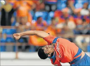  ?? Picture: AFP ?? TOPSY-TURVY: Gujarat Lions bowler Shivil Kaushik in action against the Kings XI Punjab on Sunday.