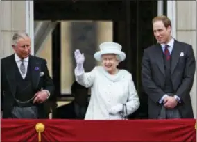  ?? AP PHOTO/LEFTERIS PITARAKIS, FILE ?? In this June 5, 2012 file photo, Queen Elizabeth II, center, accompanie­d by Prince Charles, left, and Prince William, appear on the balcony of Buckingham Palace in central London, to conclude the four-day Diamond Jubilee celebratio­ns to mark the 60th anniversar­y of the Queen’s accession to the throne.