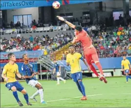  ?? PTI ?? Brazil goalkeeper Gabriel Brazao makes a clearance against Honduras during their FIFA U17 World Cup prequarter­final match in Kochi on Wednesday. Brazil went on to win 30.