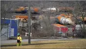  ?? GENE J. PUSKAR — THE ASSOCIATED PRESS ?? The cleanup of portions of a Norfolk Southern freight train that derailed in East Palestine, Ohio, continues on Thursday.