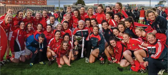  ??  ?? The Cork team celebrate with the cup after the game. TESCO HomeGrown Ladies National Football League, Division 1 Final Replay, Cork v Galway, O’Moore Park, Portlaoise