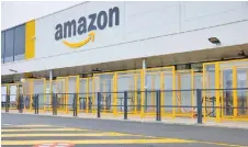  ?? — AFP photo ?? Workers at an Amazon facility in New York have roundly voted against unionisati­on – dealing a setback to a burgeoning organised labor movement one month after a landmark win at a nearby warehouse.