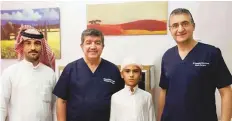  ?? ?? ■ Mohammad Munef Turfah post-surgery with his father Munef Turfah Wadi Alghadir and surgeons Dr Imad Hashim Ahmad (left) and Dr Mohammad Nooruldeen Jabbar, Specialist Neurosurge­on at Canadian Specialist Hospital, Dubai.