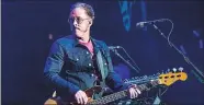  ?? AMY HARRIS/INVISION/AP ?? Scott Shriner of Weezer performs at the 2017 KROQ Almost Acoustic Christmas in Calif.