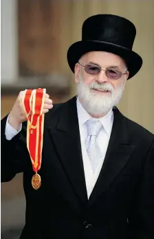  ?? IAN NICHOLSON/AFP/Getty Images ?? Fantasy writer Terry Pratchett, creator of the Discworld series who died
Thursday at the age of 66, earned wide respect for his dignified campaign for the right of critically ill patients to choose assisted suicide.