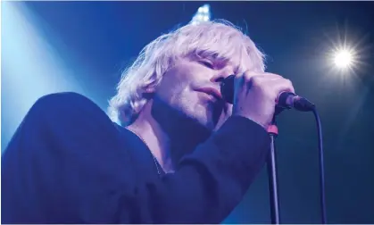  ?? ?? Like a whimsical cartoon popstar … Tim Burgess performing with the Charlatans in Glasgow. Photograph: James Edmond/Shuttersto­ck