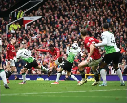  ?? ?? Kobbie Mainoo strikes to put Manchester United ahead, but Liverpool fought back, scoring a penalty