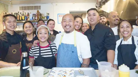  ??  ?? Filipino American chefs Lou Boquilla, Melissa Miranda, Carlo Lamagna, Francis Ang and Miguel Trinidad with their respective teams at the James Beard House