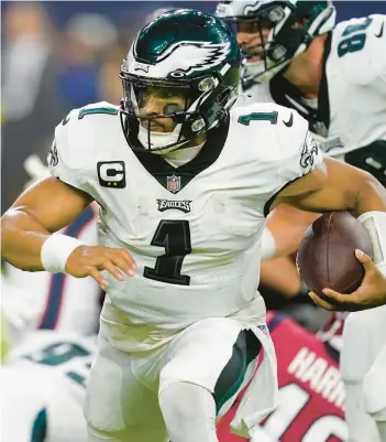  ?? TONY GUTIERREZ/AP ?? Jalen Hurts has the Eagles at 8-0, earning strong considerat­ion for this season’s MVP award.