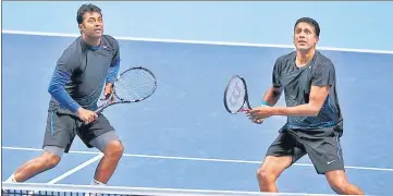  ??  ?? Leander Paes (L) and Mahesh Bhupathi.