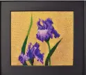  ??  ?? “Iris II” by Letitia Roller draws inspiratio­n from still life traditions to present a lifelike depiction of flowers.
