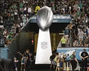  ?? MICHAEL PEREZ / ASSOCIATED PRESS ?? A giant Super Bowl trophy is seen before the Eagles began their defense of the team’s first title since 1960.