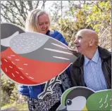  ??  ?? Fred and Lesley Higgins, who won more than £57m in 2018, deliver their nest boxes to The Miley reserve