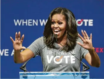  ?? Foto: Joe Raedle, afp ?? Im Augenblick tourt Michelle Obama durch die Vereinigte­n Staaten, um für mehr Wahlbeteil­igung zu werben.REFERENDUM