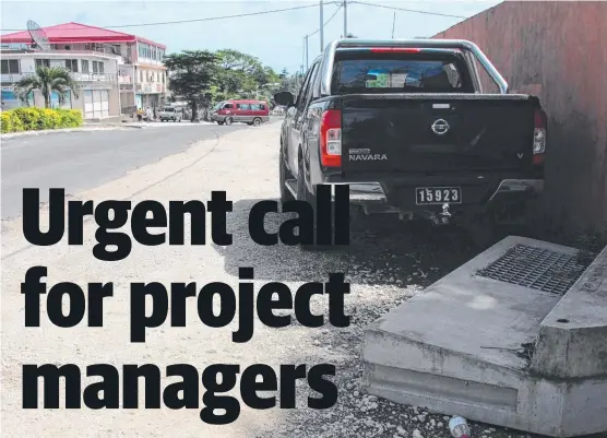  ??  ?? IT’S A SHAMBLES: A cement drain for the Port Vila Urban Developmen­t Project lies disused on the roadway in Vanuatu.