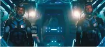  ??  ?? In “Pacific Rim Uprising,” pilots Jake ( John Boyega, left) and Lambert ( Scott Eastwood) banter like Maverick and Ice Man.