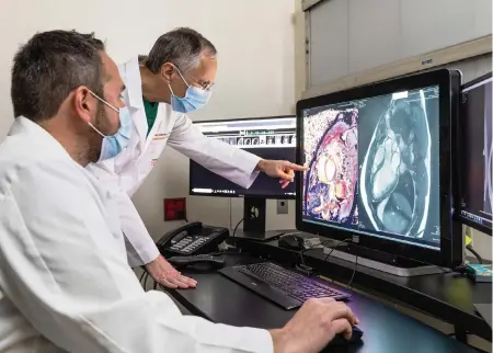  ?? KIKOR University of Miami ?? Dr. Jeffrey Goldberger, a cardiac electrophy­siologist at UHealth, the University of Miami Health System, reviews a patient's health record.