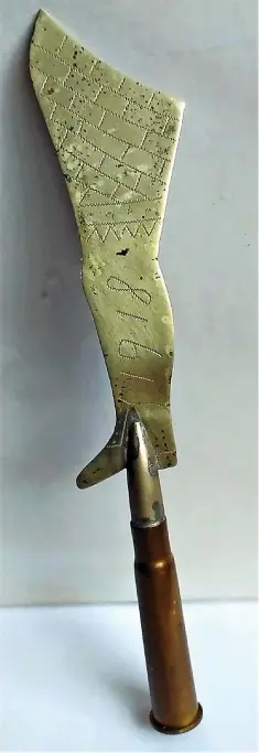  ?? ?? Trench Art letter opener, handle manufactur­ed from a cartridge shell from the former Blackheath Munition Works, 1918