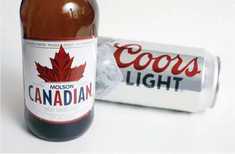  ?? STEVEN SENNE/AP FILES ?? “Consumers are drinking slightly less, but better,” says Molson Coors CEO Mark Hunter, noting the company must focus on premium and innovative drinks including pot-infused beverages.