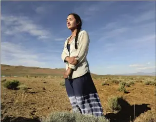  ??  ?? DARANDA HINKEY of the Paiute-Shoshone tribe opposes a lithium mine at Thacker Pass, Nev.