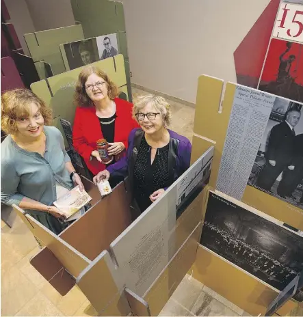  ?? DAVID BLOOM ?? From left, Provincial Archives of Alberta Executive Director Leslie Latta, Edmonton-Mill Creek MLA Denise Woollard and Edmonton Food Bank Executive Director Marjorie Bencz take in the 150 Firsts: How Alberta Changed Canada ... Forever exhibit Tuesday....