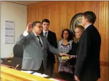  ?? FILE PHOTO ?? Watervliet City Councilman Charles Patricelli takes the oath of office from former U.S. Rep. Michael McNulty, D-Green Island, before his term began in 2017.