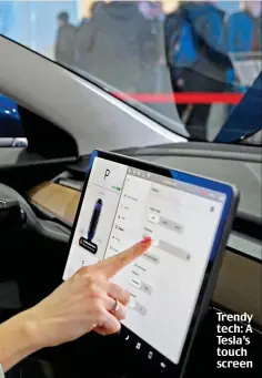  ?? ?? Trendy tech: A Tesla’s touch screen