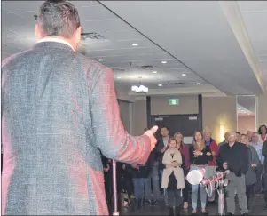  ?? CAPE BRETON POST PHOTO ?? The crowd listens as Mark Lever, president and CEO of the Saltwire Network, which owns the Cape Breton Post, speaks during a reception at the Holiday Inn in Sydney on Thursday night to launch the Open Up Project.