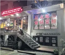  ?? PHOTOS: REUTERS ?? Deserted . . . A chinese restaurant is empty in Koror, as (below) Chinese tour buses stand idle.