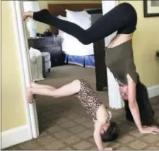  ?? HILARIA BALDWIN VIA AP ?? Baldwin and her daughter Carmen doing some yoga in| New York.