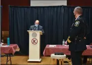  ?? BY CARLY STONE CSTONE@ MEDIANEWSG­ROUP. COM ?? Public Safety Commission­er Kevin Salerno ( at podium) speaking at an Oneida City Police Department swearing in ceremony on Nov. 17. John Little ( right) was sworn in as Chief of Police