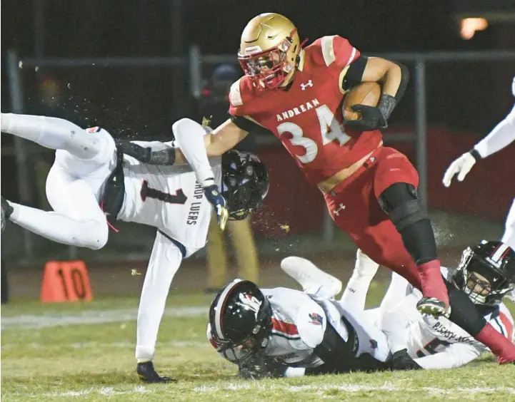  ?? KYLE TELECHAN/POST-TRIBUNE PHOTOS ?? Andrean’s Drayk Bowen (34) plows past Bishop Luers’ Nick Thompson during a Class 2A semistate game in Merrillvil­le on Friday.