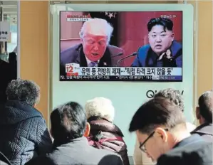  ?? AHN YOUNG-JOON THE ASSOCIATED PRESS ?? People watch a TV screen showing U.S. President Donald Trump, left, and North Korean leader Kim Jong Un at Seoul Railway Station in Seoul, South Korea. North Korea and the U.S. have traded threats and insults, leading to concerns about possible...