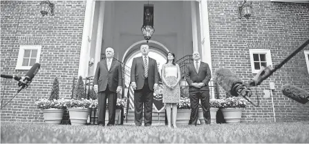  ??  ?? President Trump, center, along with then-Secretary of State Rex Tillerson, left, U.N. Ambassador Nikki Haley and National Security Adviser H. R. McMaster gather in Bedminster, N.J., on Aug. 11, 2017. JIM WATSON/AFP/GETTY IMAGES